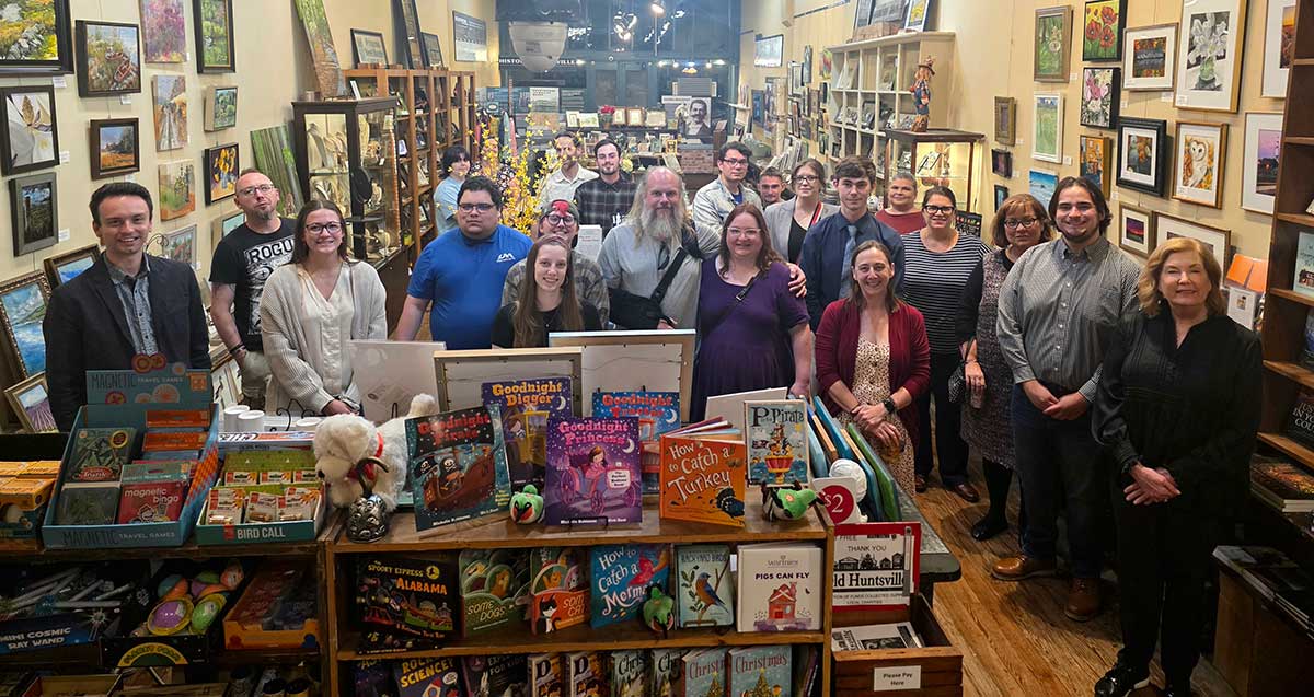 UAH History students and alumni gathered inside Harrison Brothers Hardware for “Night at the Museum,” an evening of conversation, curiosity, and connection hosted by the Historic Huntsville Foundation.